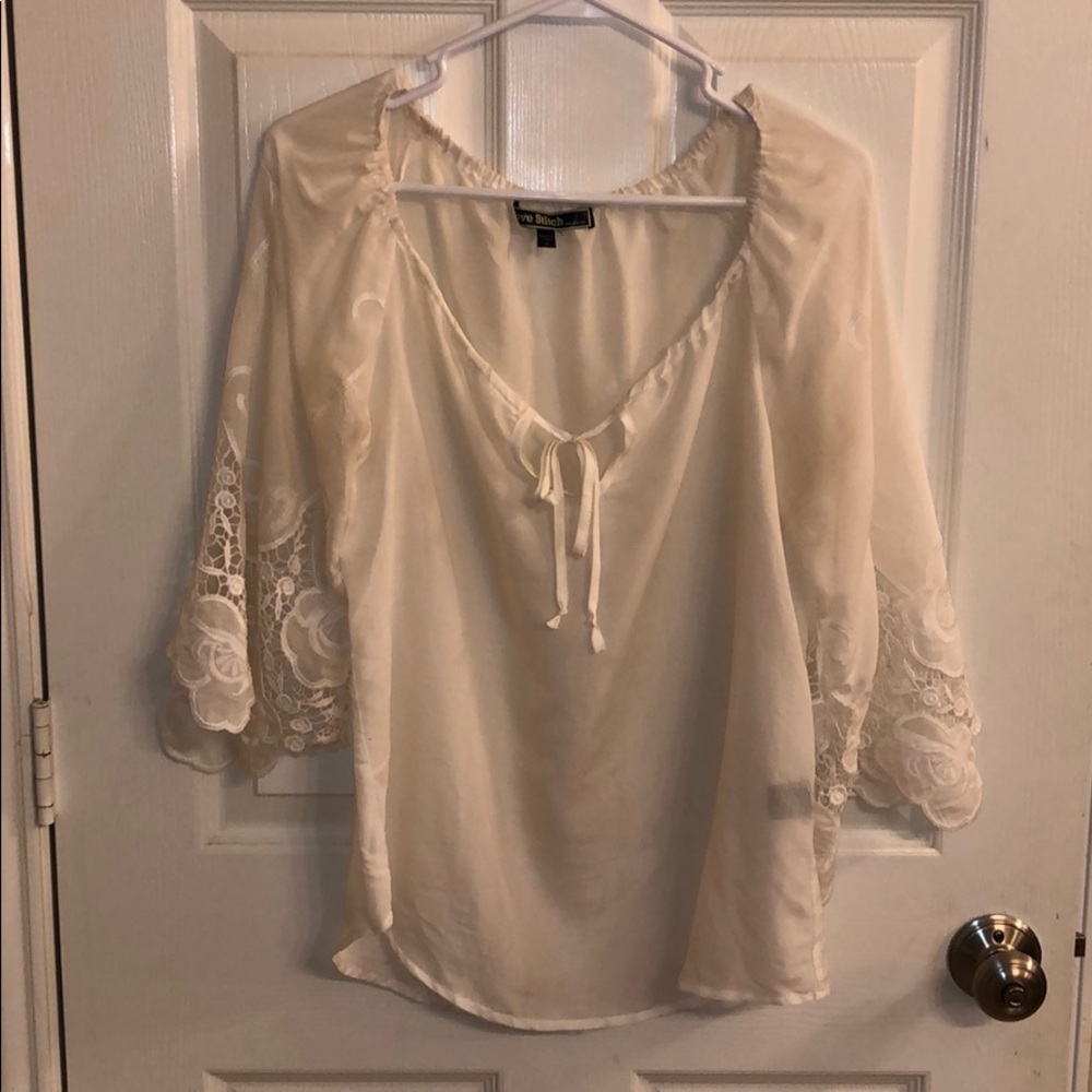 White embroidered bell sleeve top